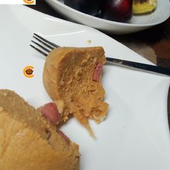 A picture of Moimoi with sausage.