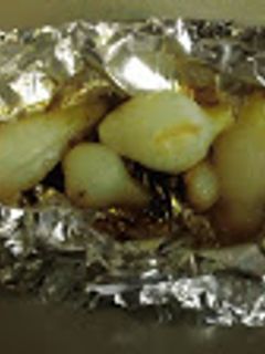 Una foto de Cebollas empapeladas para acompañar carnes  #CEBOLLAS