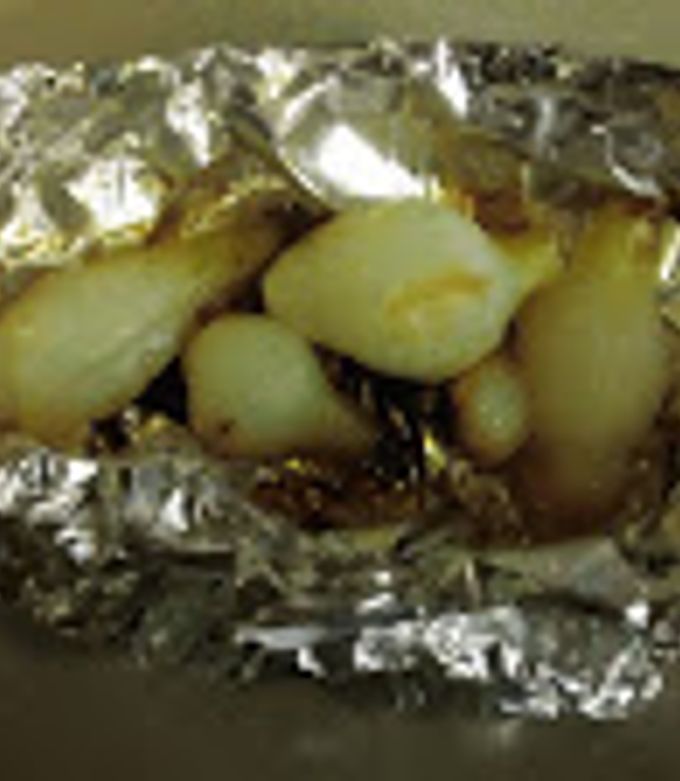 Una foto de Cebollas empapeladas para acompañar carnes  #CEBOLLAS