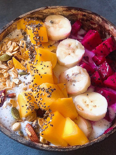 A picture of Eatclean/ Smoothie Bowl (Yogurt, Banana, Mango, Dragon Fruit, Almonds, Granola).