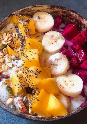 A picture of Eatclean/ Smoothie Bowl (Yogurt, Banana, Mango, Dragon Fruit, Almonds, Granola).