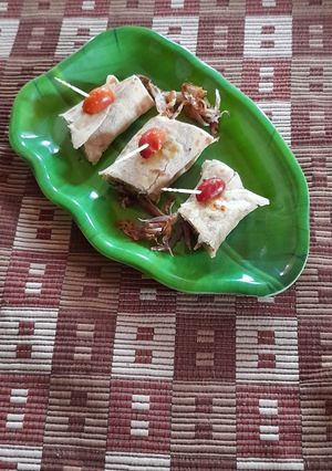 A picture of Roti Roll with Cheese Spread.