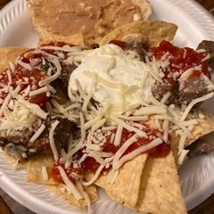 A picture of The Queen’s 👑👸steak nachos.