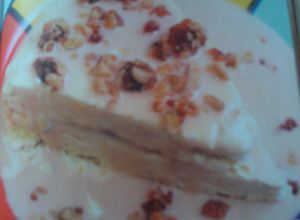 Una foto de Helado de vainilla y praliné de nueces