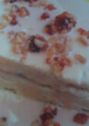 Una foto de Helado de vainilla y praliné de nueces