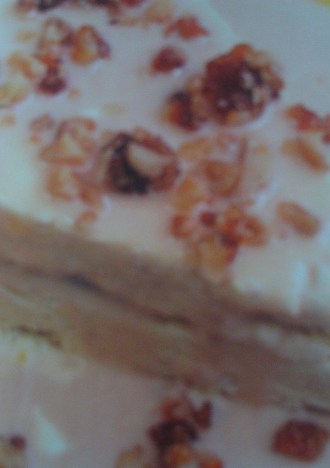 Una foto de Helado de vainilla y praliné de nueces
