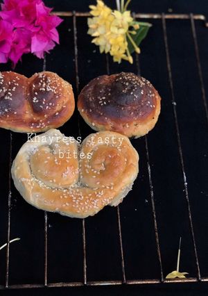 A picture of Cinnamon rolls,palmier,and challah rustic dinner rolls.