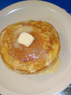 Una foto de Hot cakes de vainilla y naranja