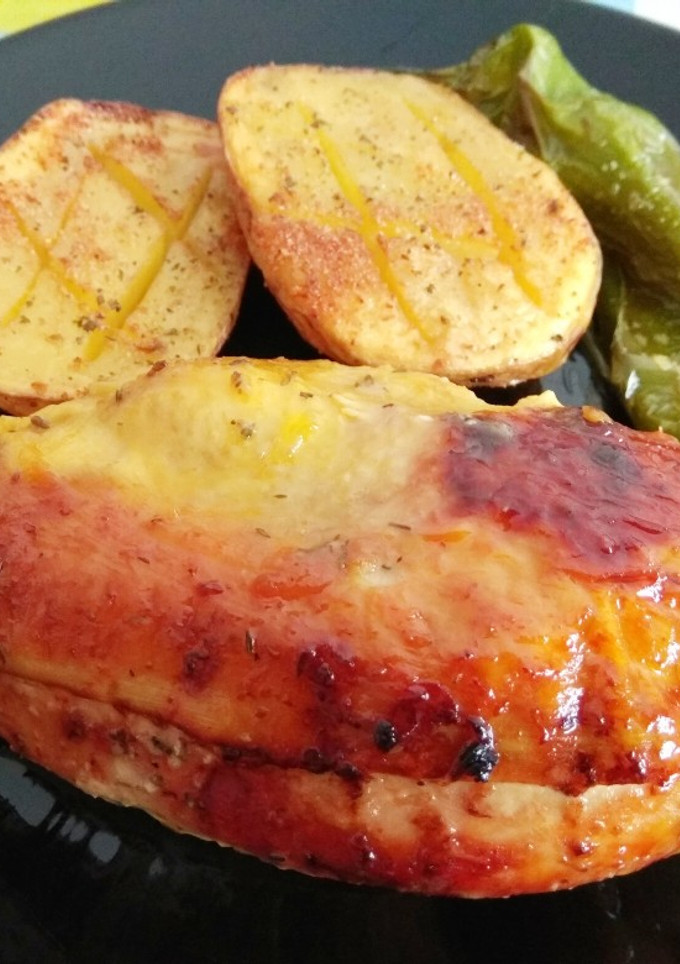 Una foto de Pollo al horno con mostaza a la miel y tomillo