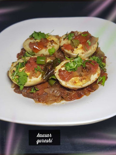 A picture of Tawa Egg Masala.