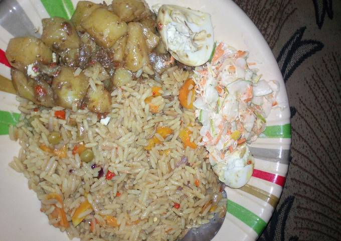 Vegetarian Jallof rice with potatoes and coleslaw