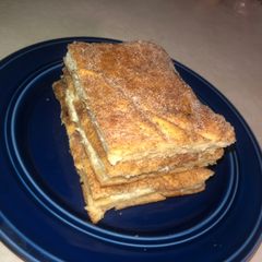 A picture of EASY Mexican Churro Cheesecake bars.
