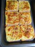 Pizza casera con pan tajado
