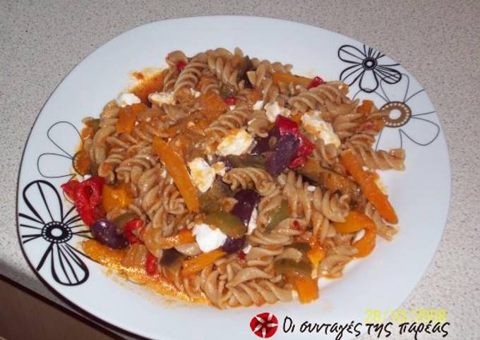 Mediterranean penne with eggplant, feta cheese and tomato