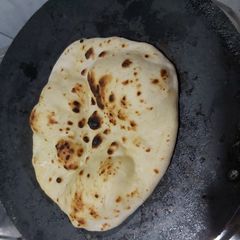 Tandoori Naan (on Stove) A picture of Tandoori Naan (on Stove).
