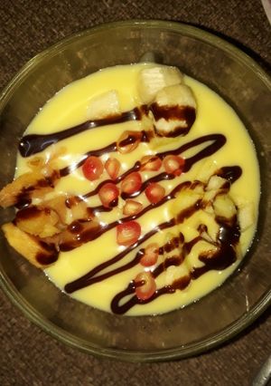 A picture of Fruit custard pudding.