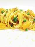 Spaghetti allo zafferano, salsa di alici, datterini e bottarga