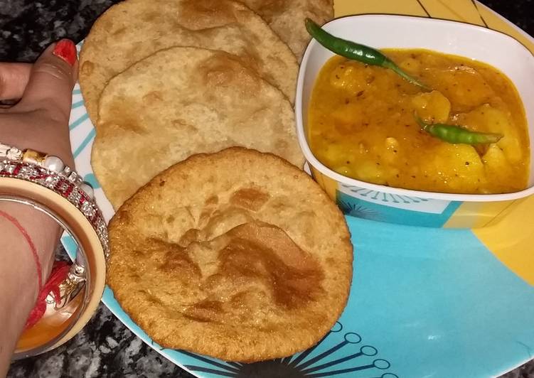 Step-by-Step Guide to Prepare Quick Potato veg with pooris