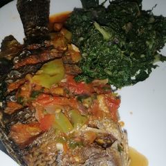 A picture of Tilapia wet fry with lime juice.