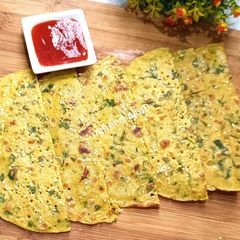 A picture of Egg Paratha With Liquid Dough.