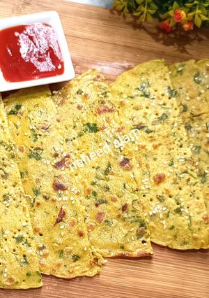 A picture of Egg Paratha With Liquid Dough.