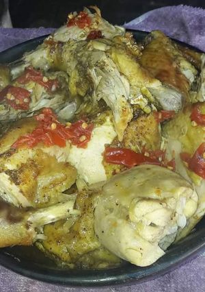 Una foto de Pollo al curry picante en disco