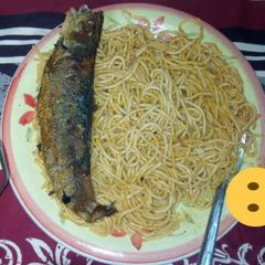 A picture of Spagetti with fish.