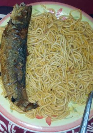 A picture of Spagetti with fish.