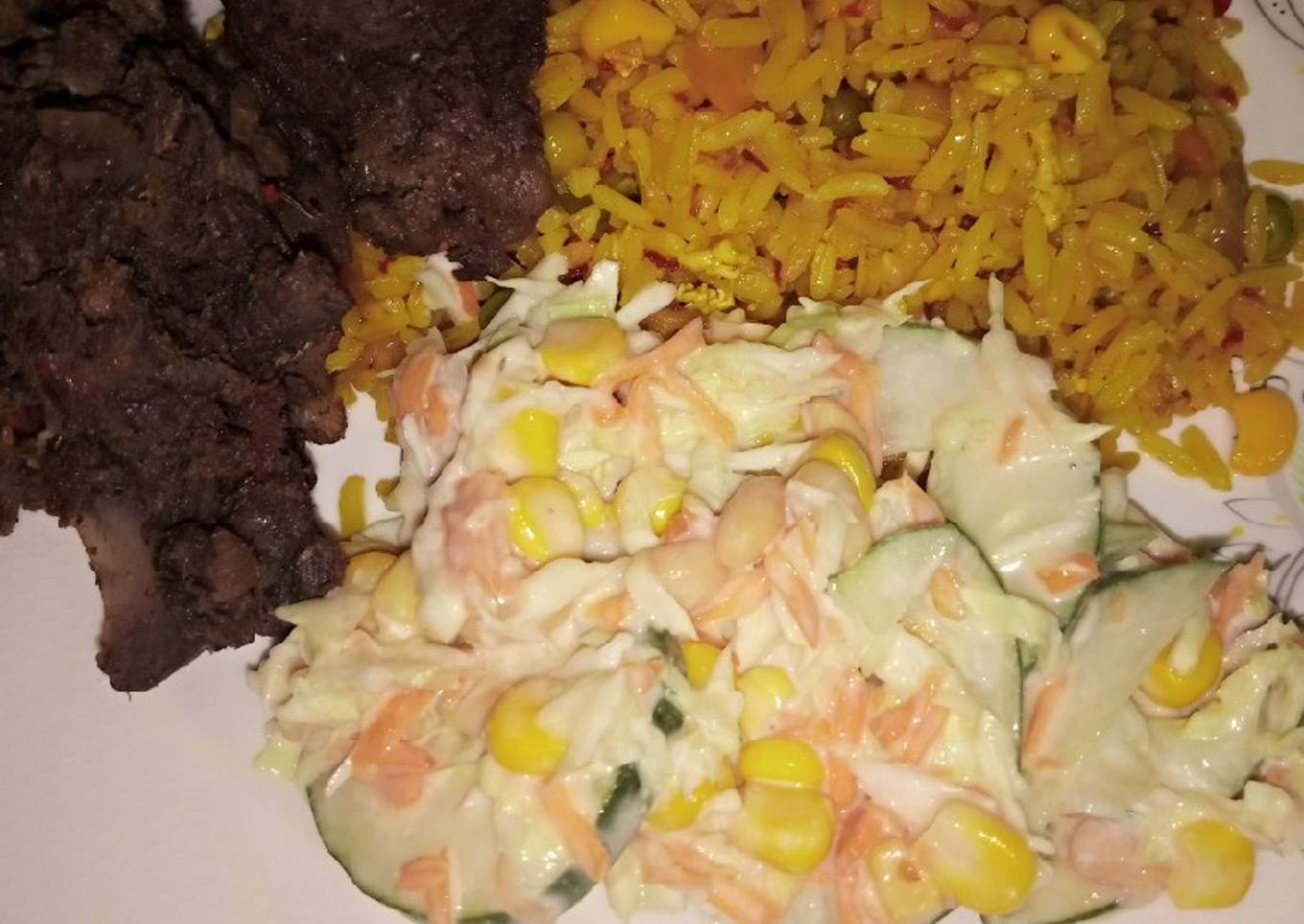 Chinese fried rice with coleslow and fry meat