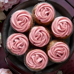 A picture of Strawberry Cupcakes with Strawberry Cream Cheese Frosting.
