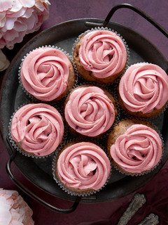 A picture of Strawberry Cupcakes with Strawberry Cream Cheese Frosting.