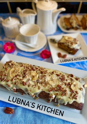 A picture of BANANA cake with cream cheese frosting :.