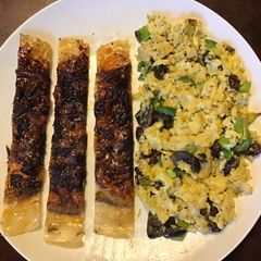A picture of California Farm Tofu Bacon and Tofu Scrambled Eggs.