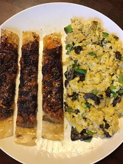 A picture of California Farm Tofu Bacon and Tofu Scrambled Eggs.