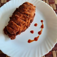 A picture of Chicken Hasselback.
