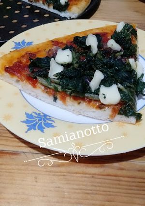 Une photo de Pizza aux épinards🍕