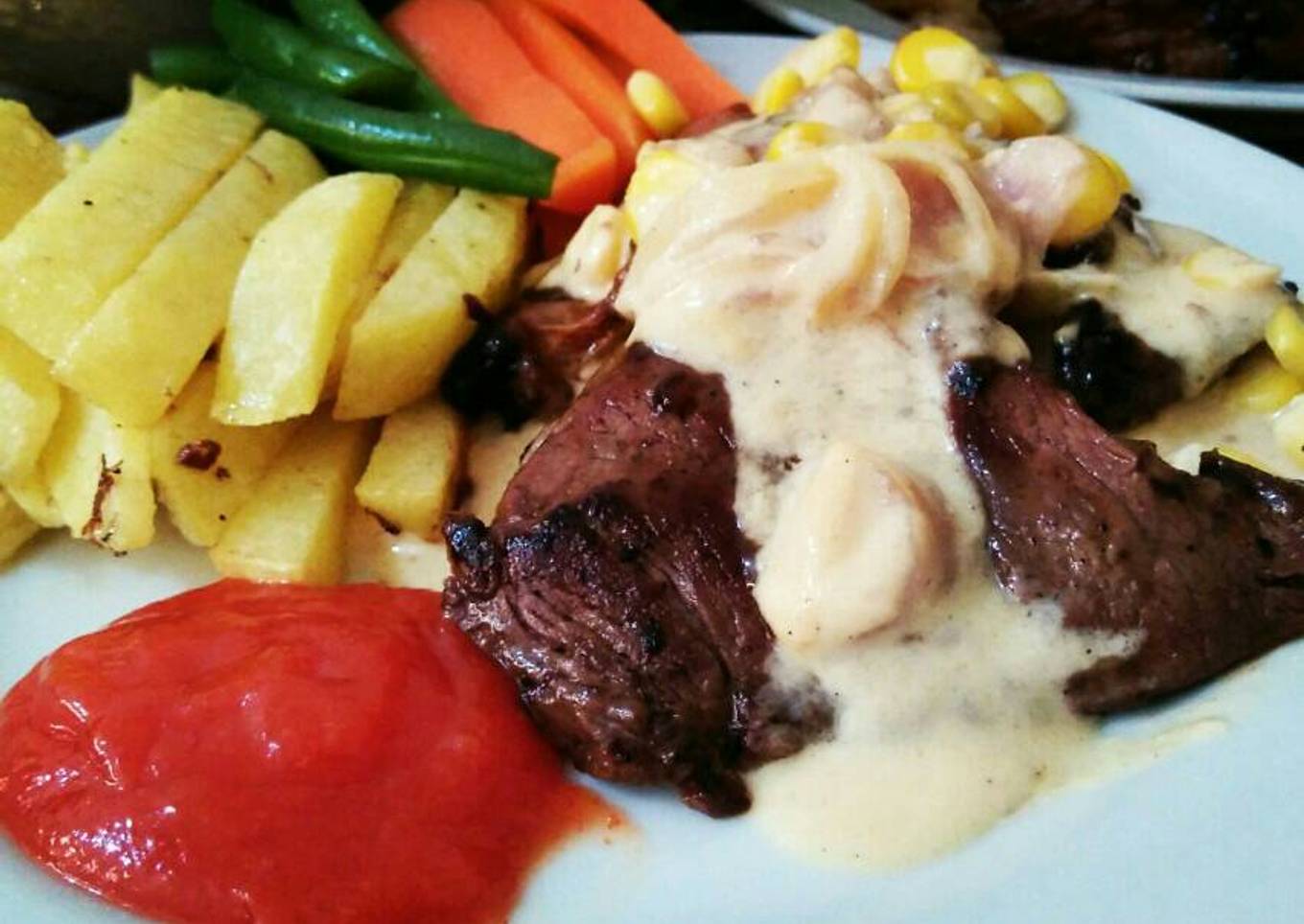 Beef steak with cheese bolognese