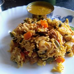 A picture of Vegetable Briyani in Pressure cooker.