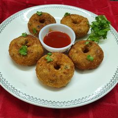 A picture of Poha and Rice flour Masala Doughnuts.