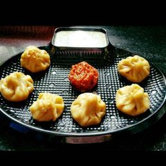 A picture of Momo's with mayonnaise sauce.