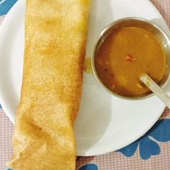 A picture of Sambhar dosa.