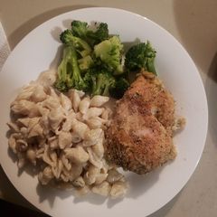 A picture of Baked chicken breast with vinaigrette.