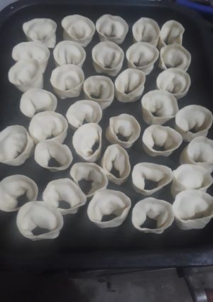 Una foto de Capeletis con salsa bolonesa