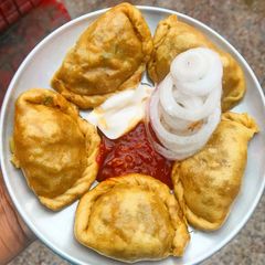 A picture of Wheat Beetroot Schezwan Momos.