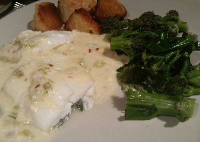 White fish in a hot smoked-cheese sauce