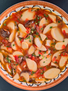 A picture of King Oyster Mushrooms in Tomato Sauce.