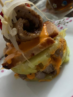 Una foto de Timbales de patata y solomillo al chimi churry