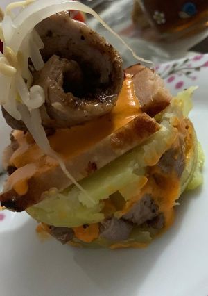 Una foto de Timbales de patata y solomillo al chimi churry