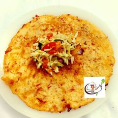 A picture of Salad with omelette.