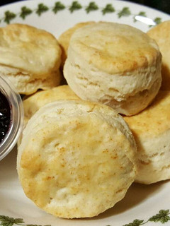A picture of Biscuit with blueberry jam.